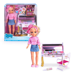 Nancy Nails Style Doll with blonde hair in a bun, dressed in a denim mini skirt and pink jacket, surrounded by manicure ac...